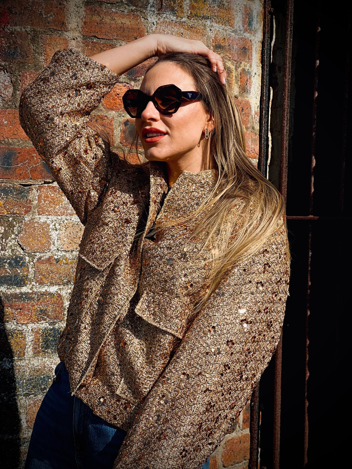 Glittering gold bomber jacket