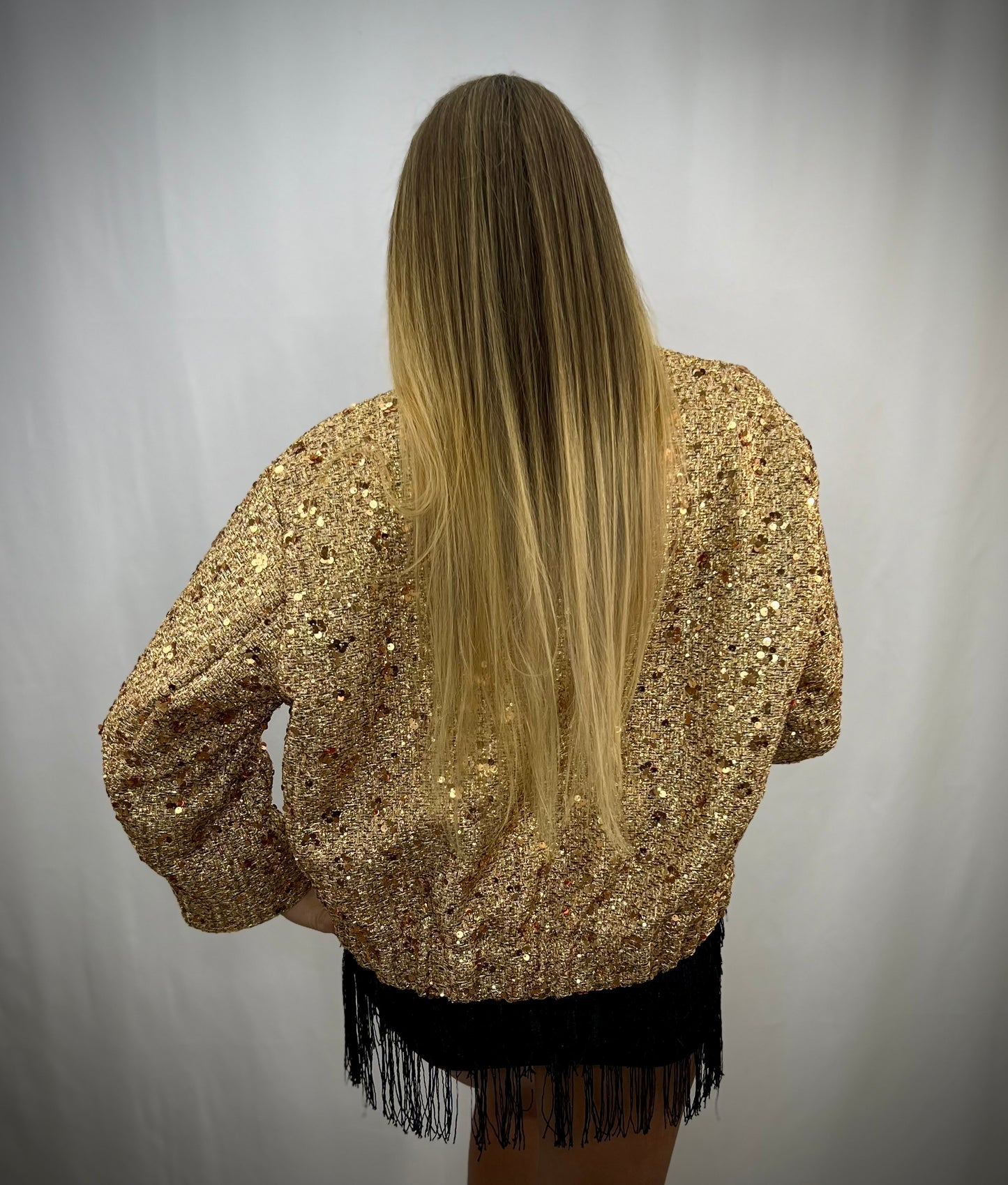 Glittering gold bomber jacket