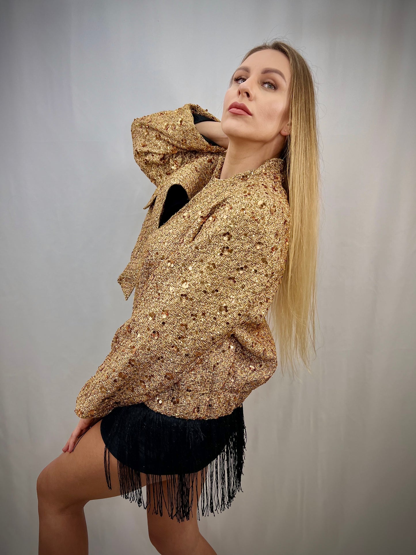 Glittering gold bomber jacket