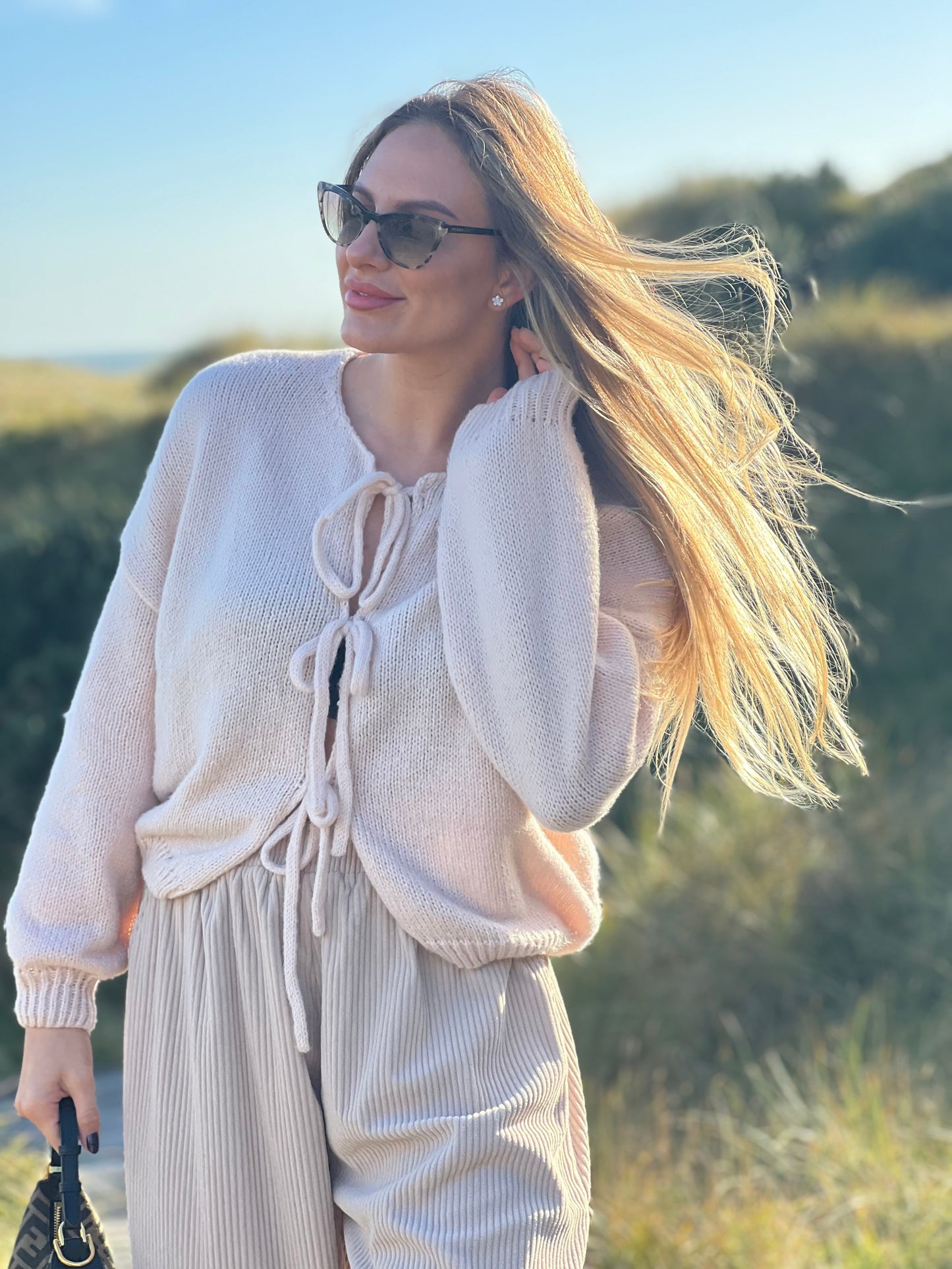 Lace-up knitted cardigan