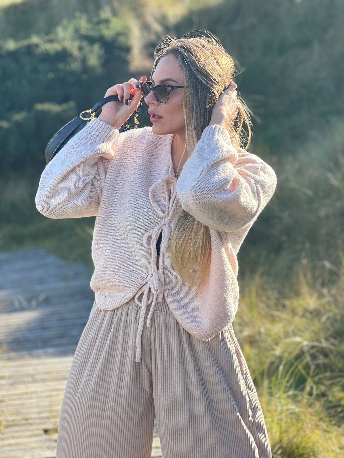 Lace-up knitted cardigan