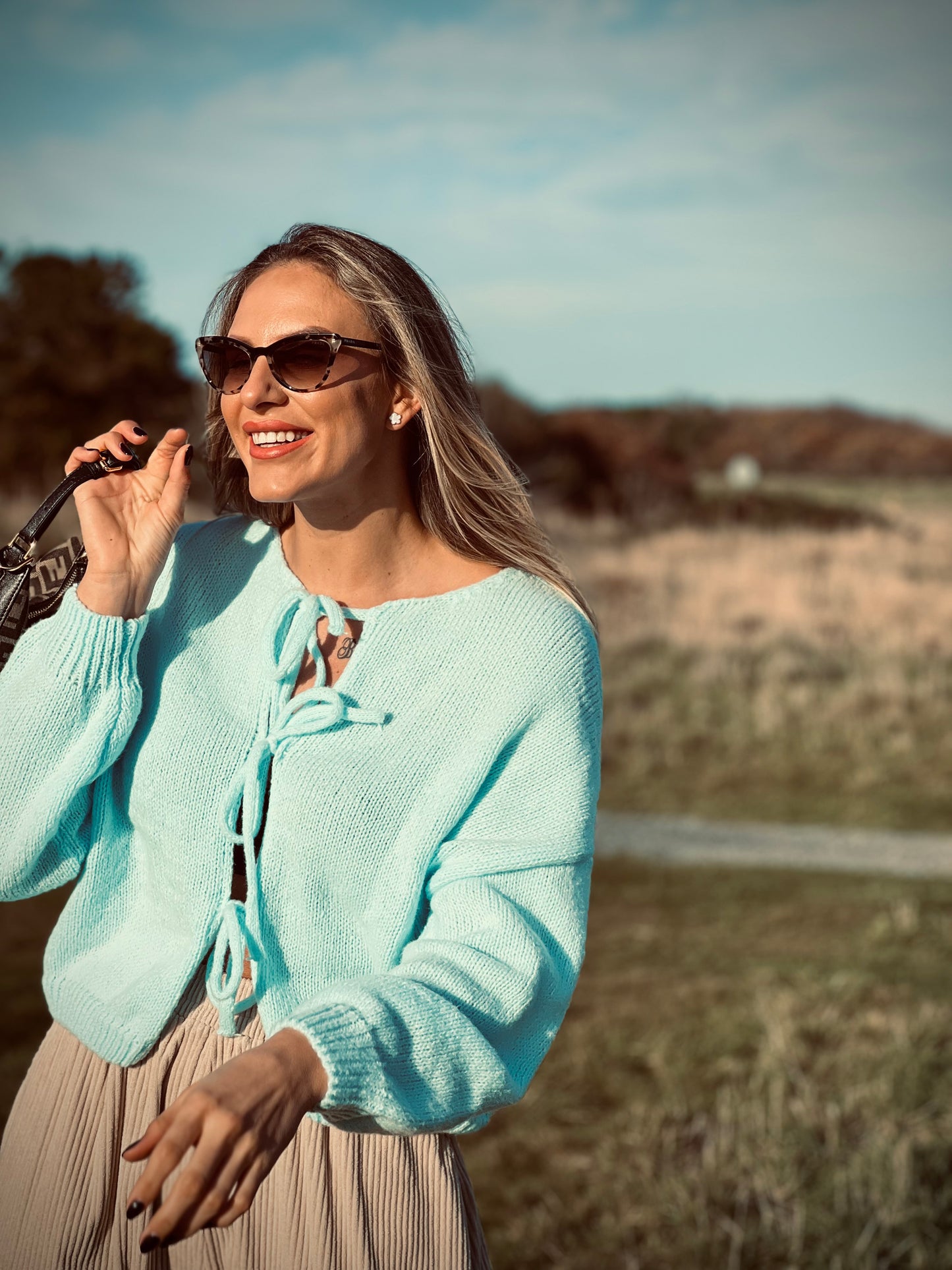 Lace-up knitted cardigan