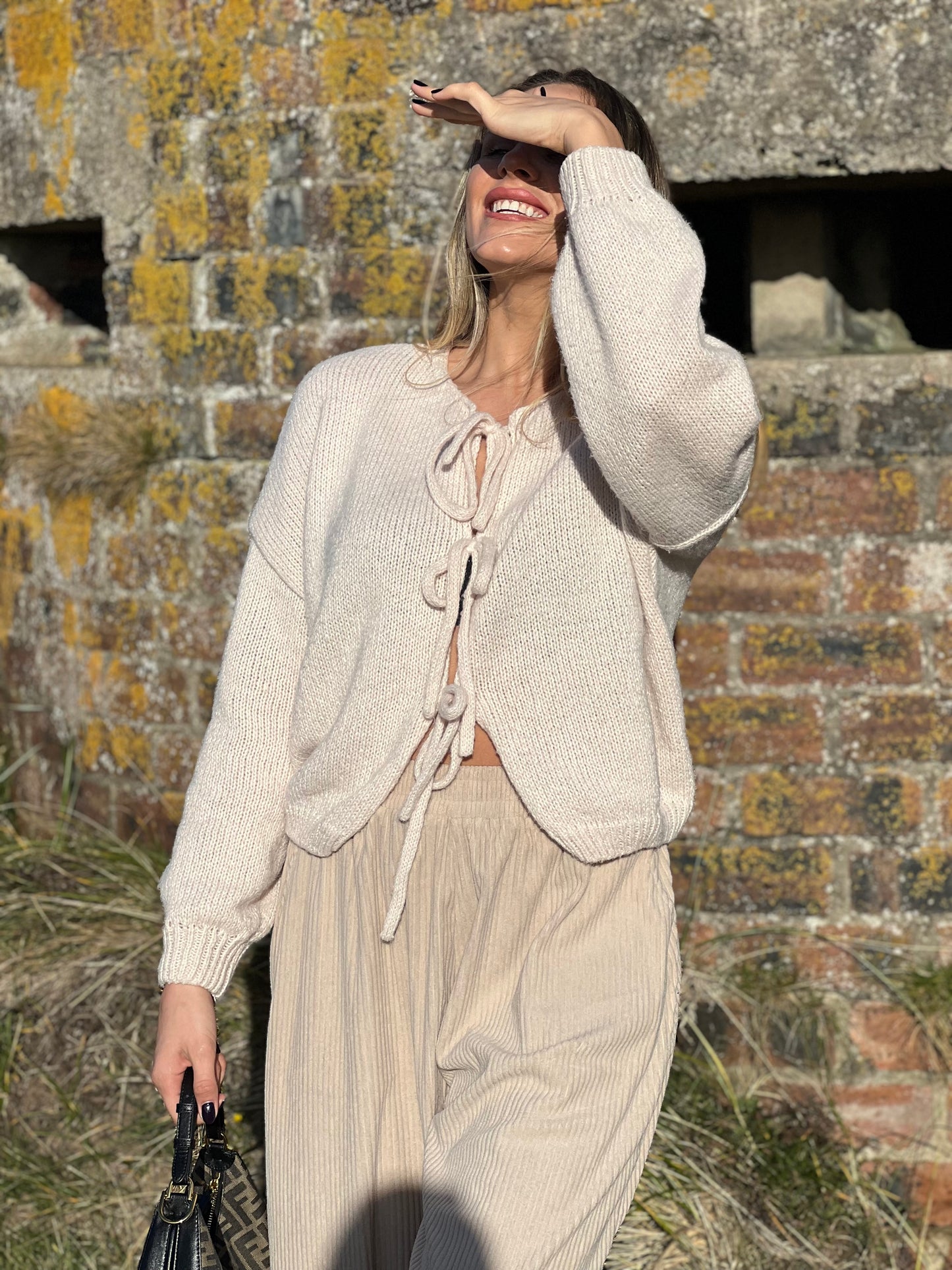 Lace-up knitted cardigan