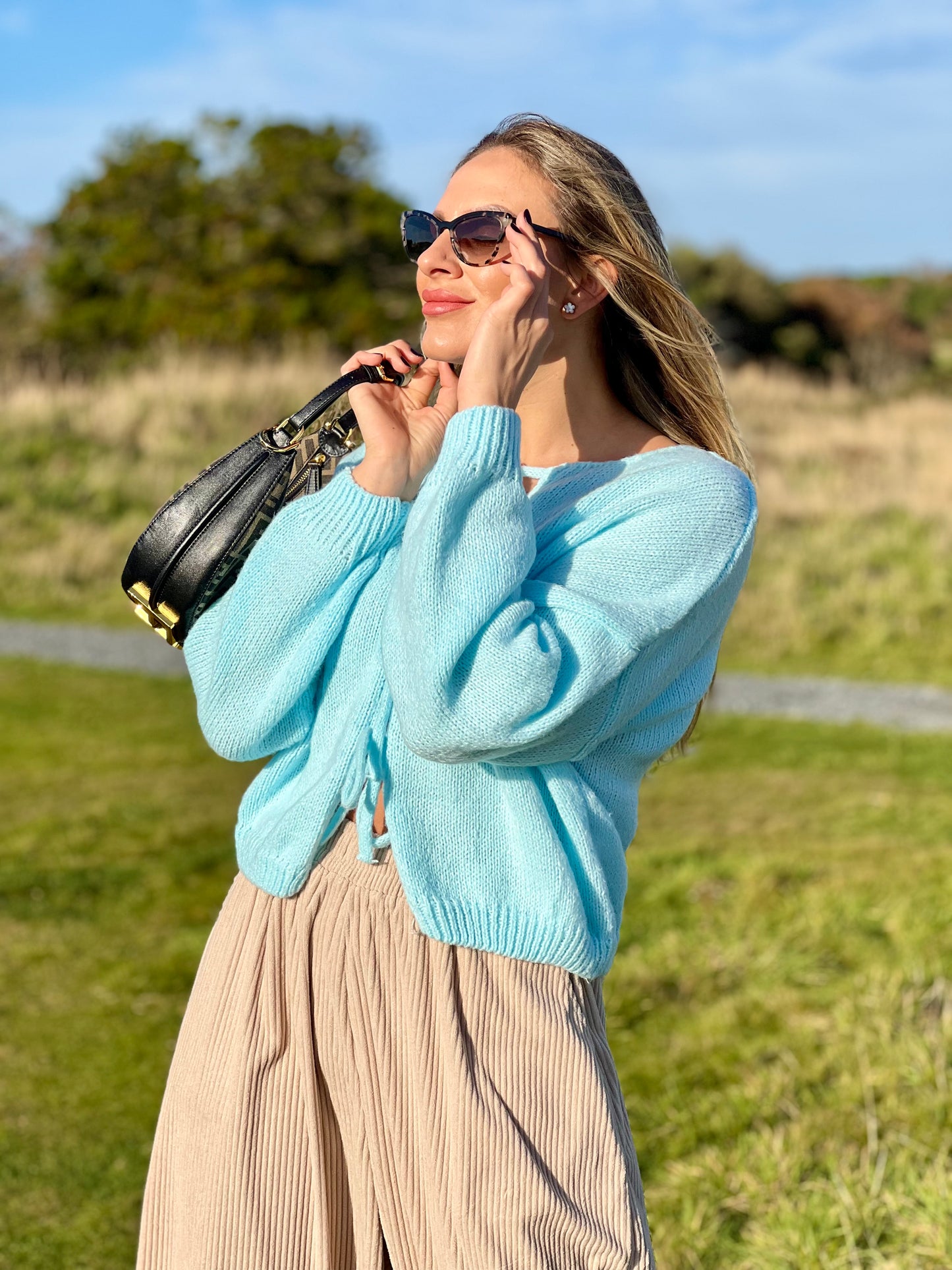 Lace-up knitted cardigan