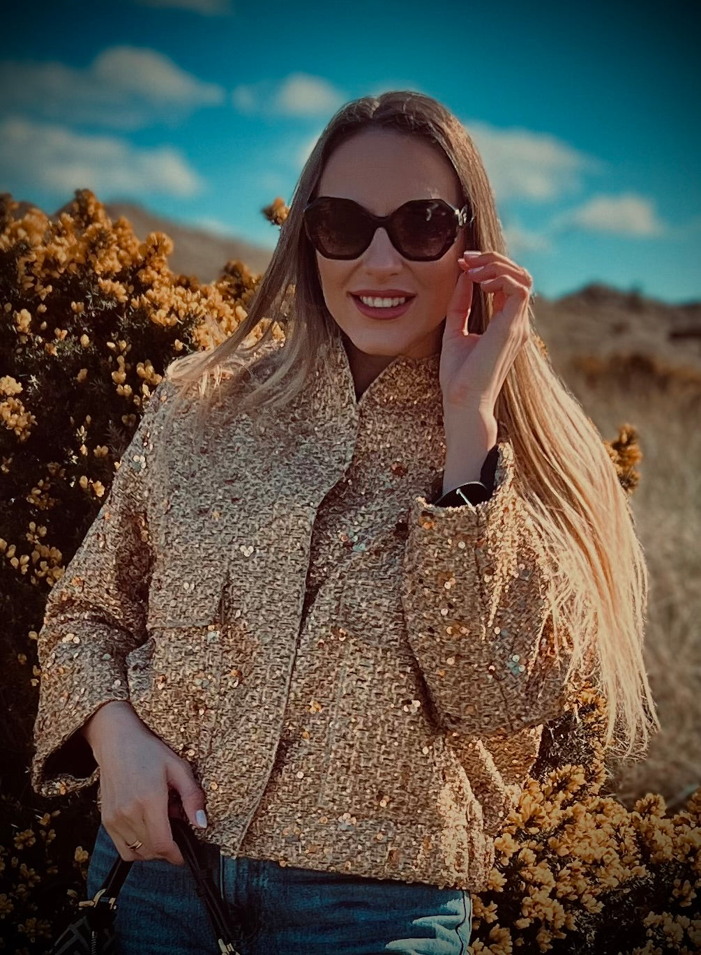 Glittering gold bomber jacket