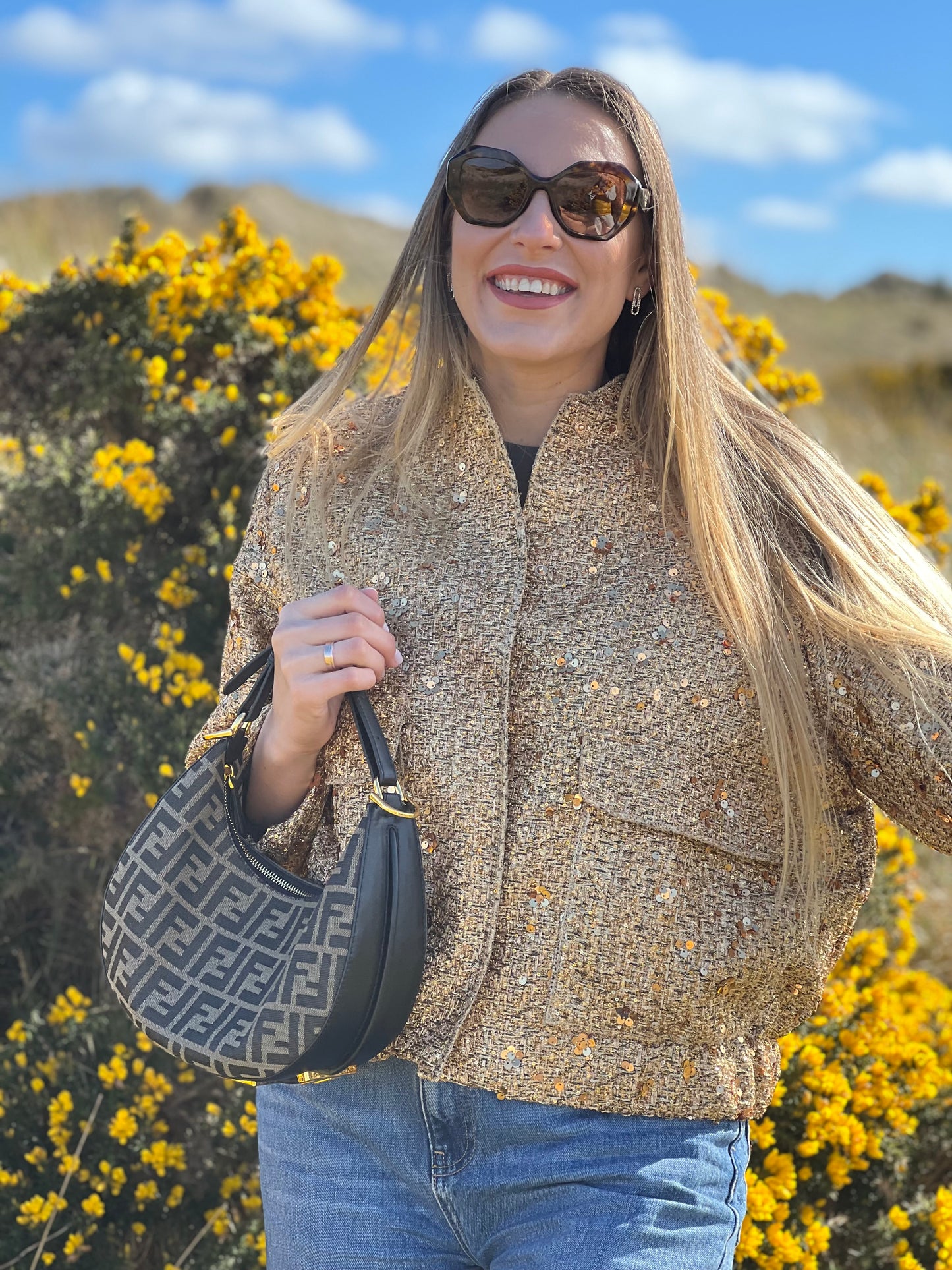 Glittering gold bomber jacket