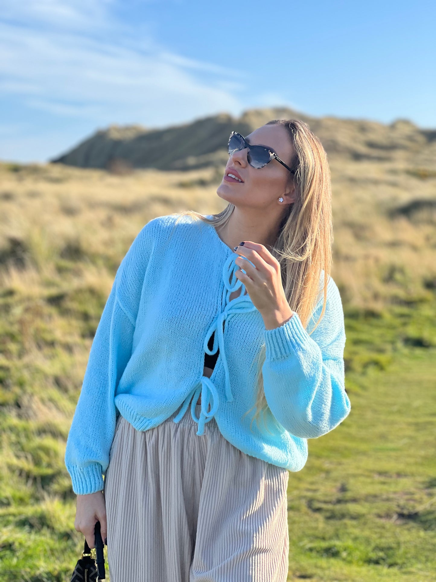 Lace-up knitted cardigan